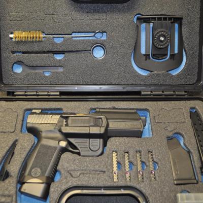 Canik TP9 Elite Combat executive.